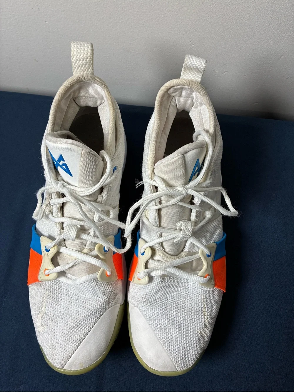 Nike White Youth Athletic Sneakers with Blue & Orange Accents